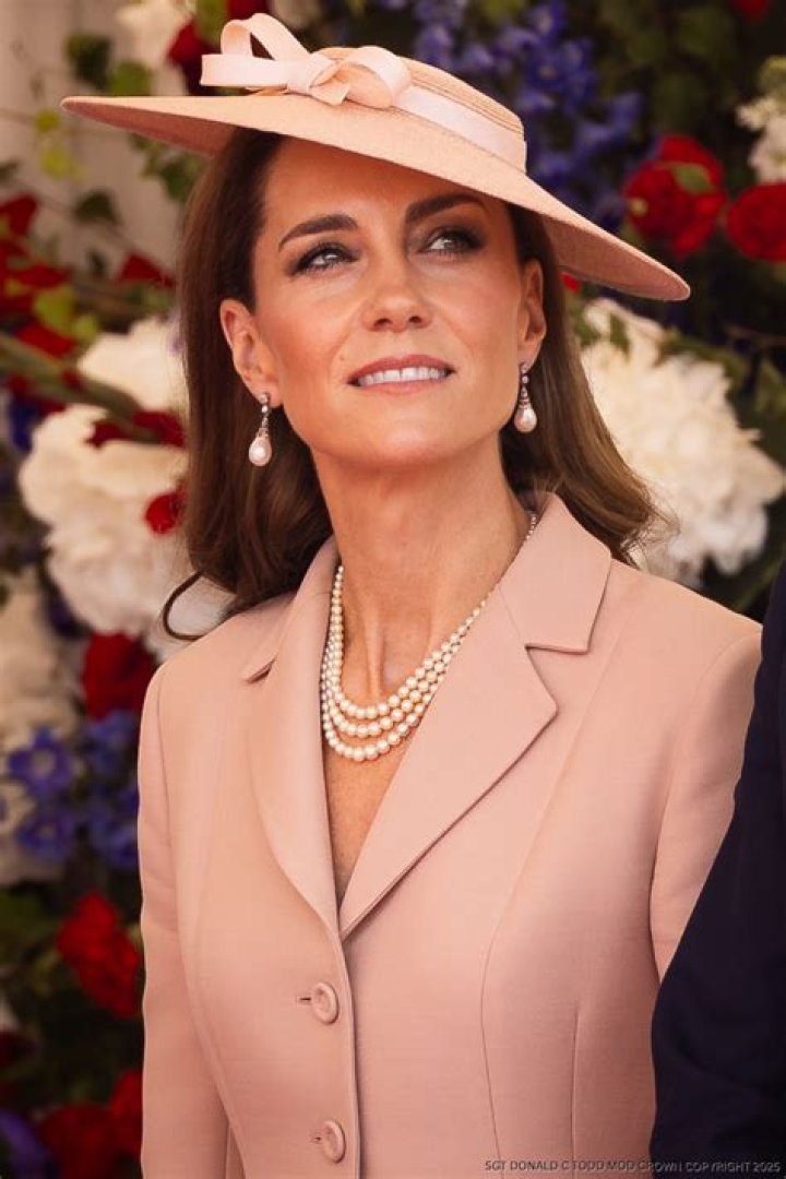 Kate Middleton Is a Standout in New Red Cape and Hat While Hosting State Visit With Prince William