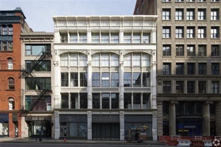 NYC's First Life-Sized Office Building Wrap Debuts at KPG Funds 446 Broadway/L'Atelier in SOHO