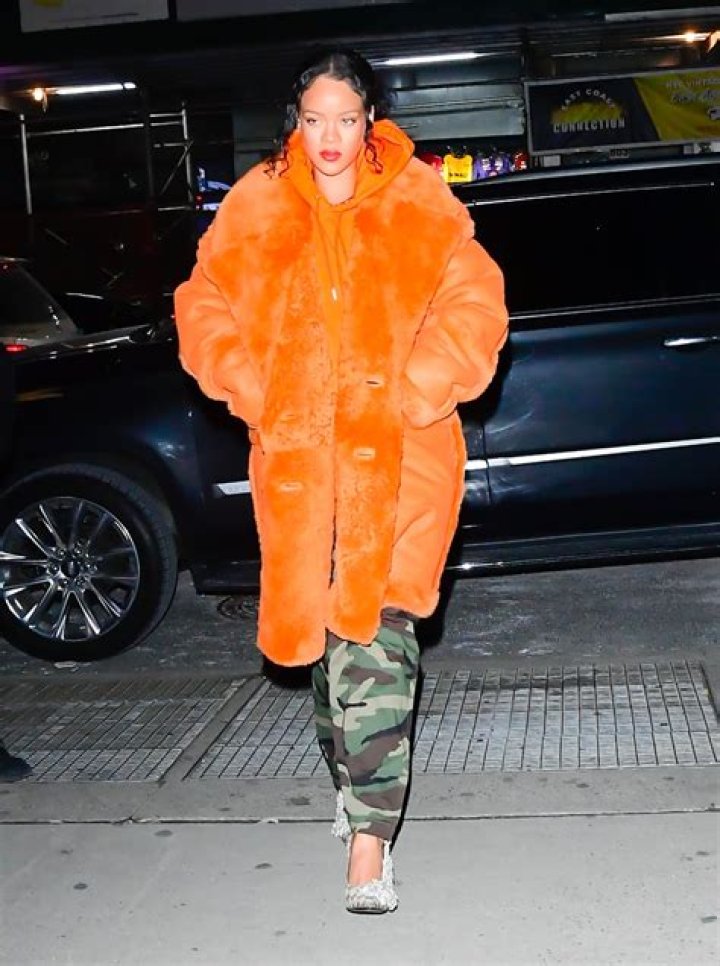 See Rihanna Pair a Bright-Orange Coat with Camo Pants