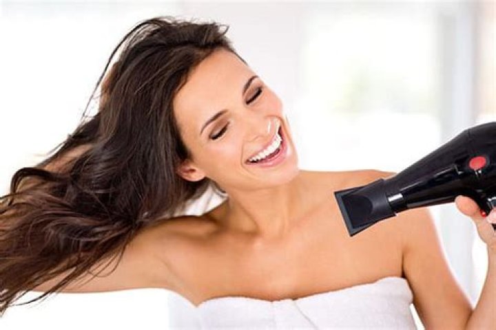 Why using a hairdryer is actually better for your hair than air-drying